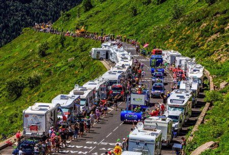 Photo for Pas de Peyrol, France - July 6,2016: Enedis Caravan during the passing of the Publicity Caravan on the road to Pas de Pyerol (Puy Mary) in Cantal,in the Central Massif, during the stage 5 of Tour de France on July 6, 2016. Enedis is a French electric - Royalty Free Image