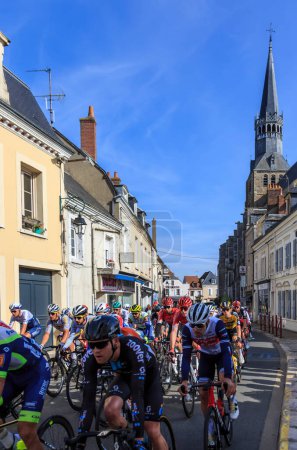 Photo for Bonneval, France - October 10, 2021: The peloton riding in Bonneval during road cycling race Paris-Tour 2021. - Royalty Free Image