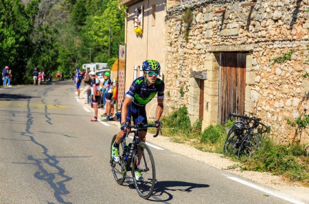 Photo for Mont Ventoux, France - July 14,2016: The Spanish cyclist Ion Izagirre Insausti of Team Movistar, riding on the road to Mont Ventoux, during the stage 12 of Tour de France 2016. - Royalty Free Image