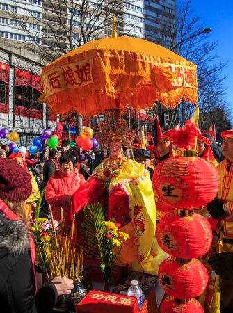 Photo for Paris, France-February 25,2018: Image of a traditional mobile shrine during the 2018 Chinese New year parade in Paris. - Royalty Free Image