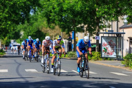 Photo for Luisant, France - 06, June, 2023: The peloton rides during the stage 1 of Tour Eure-et-Loir 2023. - Royalty Free Image