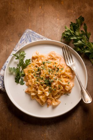 butterfly pasta with smoked salmon cream sauce and parsley