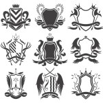 Knight shields heraldic icon set. Vintage monochrome knight award elements collection. Royal badges, luxury filigree emblems. Various decorative elements on white background.