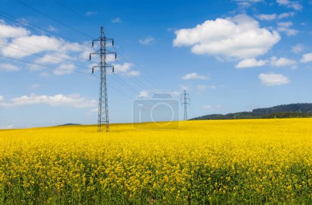 Photo for High voltage poles supply electricity to areas outside the city - Royalty Free Image