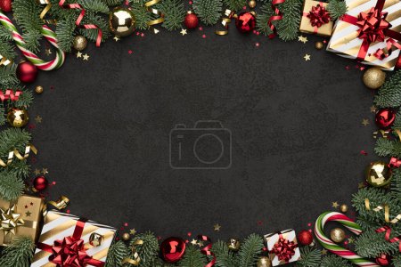 Téléchargez les photos : Cadre d'ornement de Noël sur fond noir - en image libre de droit