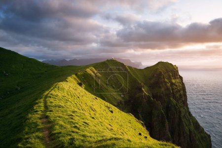 Photo for Path Leading to Kallur Lighthouse on Kalsoy Island, Faroe Islands - Royalty Free Image