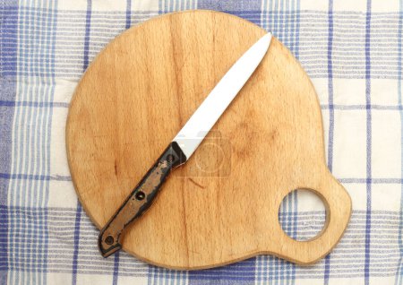 Photo for Kitchen  board and knife, top view - Royalty Free Image