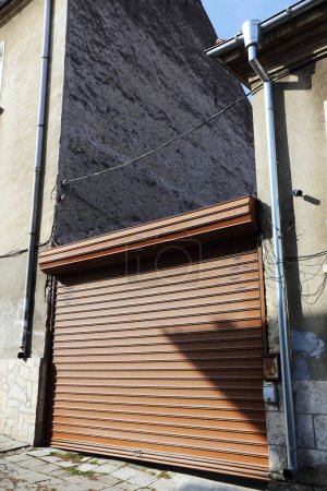 Photo for Corrugated metal doors of garage - Royalty Free Image
