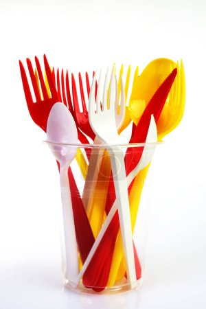 Photo for Some colored plastic utensils on white - Royalty Free Image