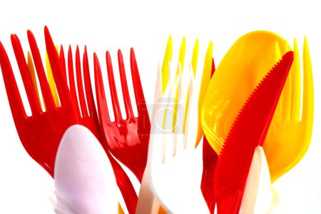 Photo for Some colored plastic utensils on white - Royalty Free Image