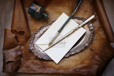 Photo for Vintage letter knife, quill and envelope - Royalty Free Image