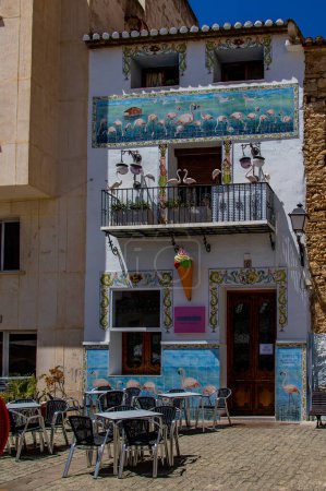 Photo for Beautiful original townhouse with pink flamingos in Calpe, landmark Spain - Royalty Free Image