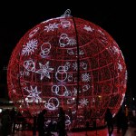 beautiful big glowing red bauble Christmas decoration in Alicante, Spain at night