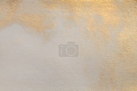 Photo for Soft wet watercolor paper texture painting wall. Abstract gold, nacre and beige marble copy space background. - Royalty Free Image