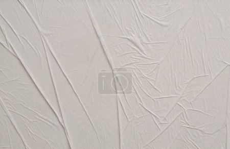 Foto de Papel húmedo arrugado vacío textura en blanco copia espacio fondo de la pared. Color gris pastel beige. - Imagen libre de derechos