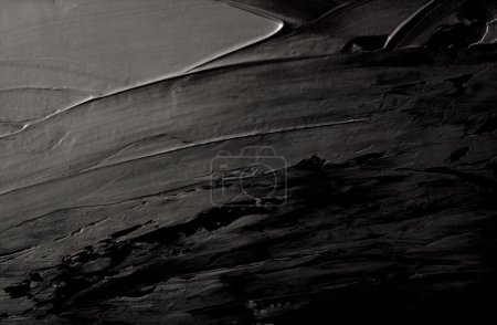 Foto de Óleo negro y acrílico frotis borrón pincelada pared de pintura. relieve abstracto estuco textura color mancha horizontal copia espacio lienzo fondo. - Imagen libre de derechos