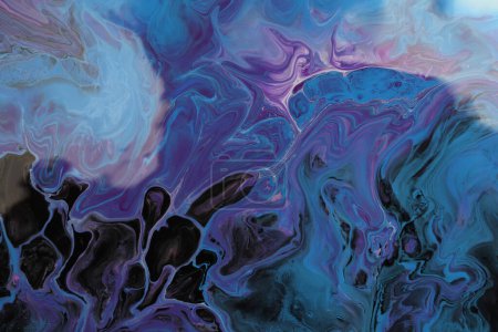 Foto de Art Abstract flow pour acrylic, ink and watercolor marble painting. Blue Color wave texture blots background. Fluid Art. - Imagen libre de derechos
