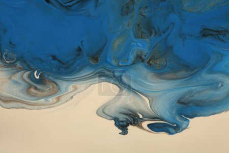 Photo for Art Abstract flow pour acrylic, ink and watercolor marble painting. Blue and beige Color wave texture blots background. Fluid Art. - Royalty Free Image