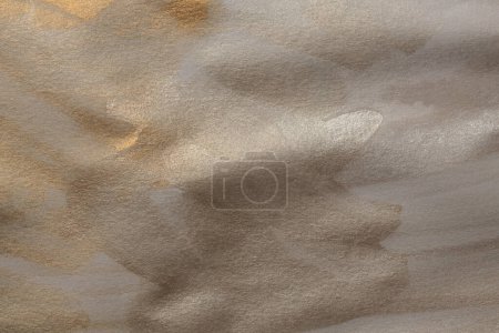 Téléchargez les photos : Watercolor paper texture painting wall. Abstract gold, nacre and beige marble copy space background. - en image libre de droit