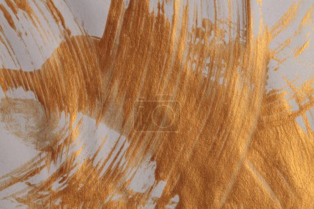 Foto de Art modern gold oil and acrylic smear blot canvas painting wall. Abstract texture color stain brushstroke texture background. - Imagen libre de derechos