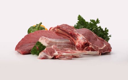 Téléchargez les photos : Raw lamb, beef and pork meat on light background - en image libre de droit