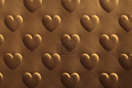 Photo for Abstract gold and bronze texture color light shadow background. Paper with relief heart shape. - Royalty Free Image