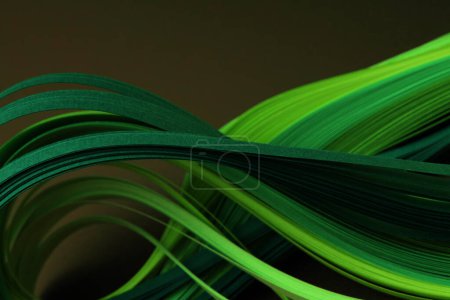 Photo for Neon green color strip wave curve paper line on black. Abstract texture background. - Royalty Free Image