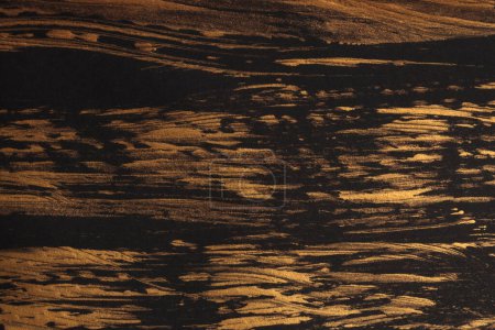 Foto de Arte óleo y acrílico mancha blot pared de pintura de lienzo. Textura abstracta oro, bronce, color negro mancha pincelada textura fondo. - Imagen libre de derechos