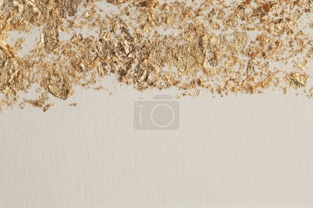 Foto de Gold (bronze) glitter, beige empty paper canvas background. Abstract copy space texture. - Imagen libre de derechos