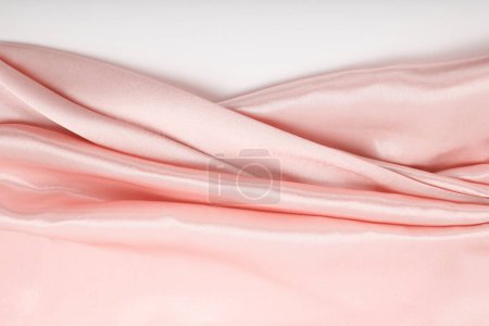 Photo for Pink nacre wave fabric silk. Abstract texture horizontal copy space background. - Royalty Free Image