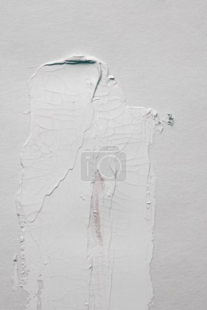 Foto de Pincelada gris en pared vacía gris. Fondo de textura abstracta. - Imagen libre de derechos