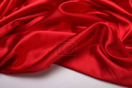 Photo for Red nacre wave fabric silk. Abstract texture horizontal copy space background. - Royalty Free Image
