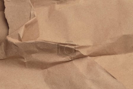 Foto de Scrapbook beige arrugado paquete viejo papel artesanal en blanco textura copia espacio fondo. - Imagen libre de derechos