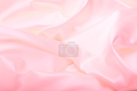 Foto de Rosa perla holográfica tela de la onda de seda. Textura abstracta horizontal copia espacio fondo. - Imagen libre de derechos