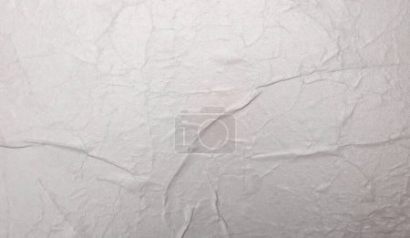 Foto de Papel húmedo arrugado vacío textura en blanco copia espacio fondo de la pared. Gris nácar beige pastel color. - Imagen libre de derechos