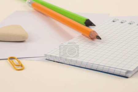 Photo for Empty copy space Blank paper note and pencil on beige neutral table. Art home office desk workspace. - Royalty Free Image