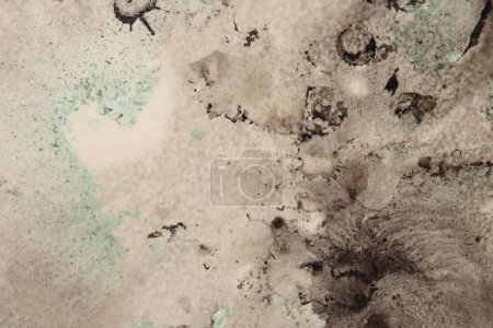 Photo for Black ink blot and watercolor drop splash blots on light beige paper background. - Royalty Free Image