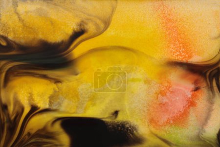Photo for Black ink blot and watercolor pour flow wave color on wet yellow paper background. - Royalty Free Image