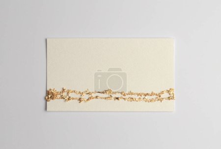 Photo for Gold (bronze) glitter empty canvas frame on beige gray paper background. Abstract copy space texture. - Royalty Free Image