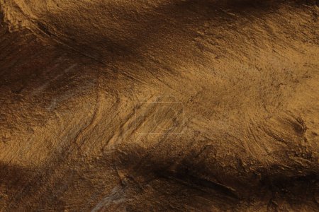 Foto de Grunge rústico oro bronce pincelada pintura blot frotis pared textura fondo. - Imagen libre de derechos