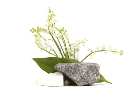 Photo for Stone platform podium and lily of the valley flower. Minimal empty display product presentation scene background. - Royalty Free Image