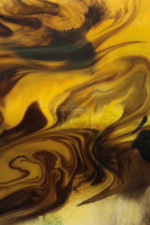 Photo for Black Ink watercolor flow blot in Yellow water background. - Royalty Free Image