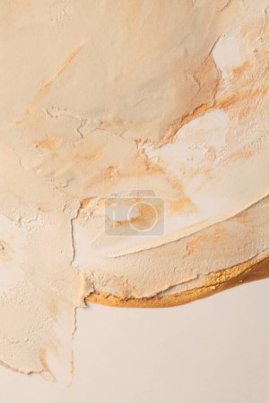 Photo for Art oil and acrylic smear blot canvas painting stucco wall. Abstract texture pastel beige, gold color stain brushstroke relief texture background. - Royalty Free Image