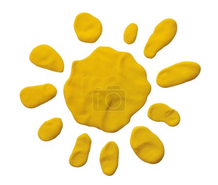 Téléchargez les photos : Jaune plasticine texture à la main cadre soleil sur fond blanc - en image libre de droit