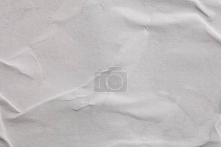Foto de Gris beige arrugado papel artesanal grano en blanco, textura copia espacio fondo. - Imagen libre de derechos