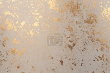 Photo for Crumble Paper texture painting glow glitter blot wall. Abstract gold, nacre and beige stain copy space background. - Royalty Free Image