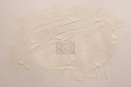 Téléchargez les photos : Huile d'art et acrylique frottis buvard toile peinture mur de stuc. Texture abstraite beige, couleur pastel nacre tache coup de pinceau relief texture fond - en image libre de droit
