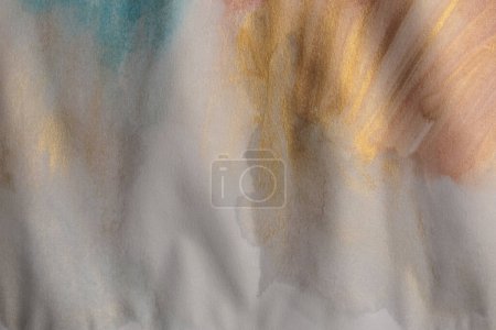 Grain wet watercolor paper texture blot painting wall. Abstract nacre gold, beige marble copy space background.