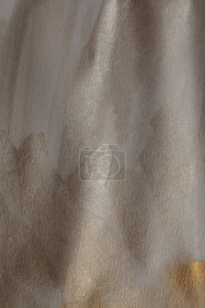 Grain wet watercolor paper texture blot painting wall. Abstract nacre gold, silver marble copy space background.
