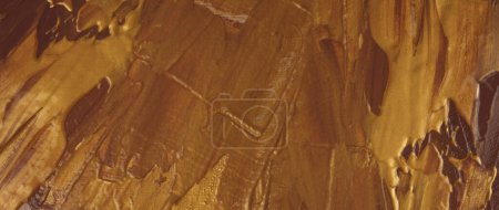 Foto de Arte Abstracto pared de pintura de manchas de acrílico. Bronce, marrón y oro Color lienzo cepillo textura copiar espacio horizontal fondo. - Imagen libre de derechos